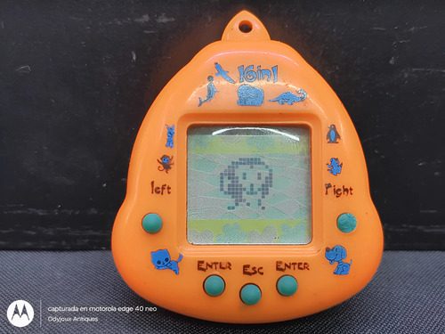 Mascota Virtual De Juguete 16 En 1 Tamagotchi Usado Detalle Naranja