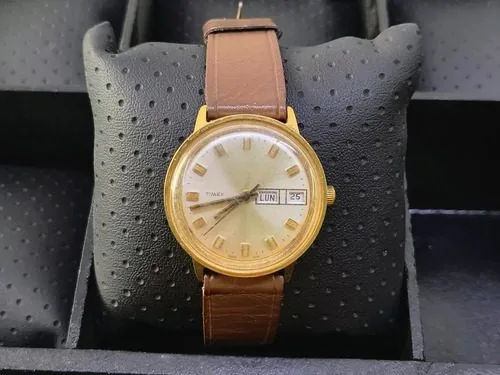 Reloj Mecánico Cuerda Timex Dorado Vintage 70s Para Reparar  Café Dorado Beige — Coleccionables vintage, años 70s