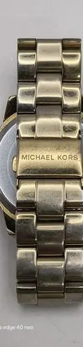 Reloj Michael Kors Mk6255 Dorado Metálico Con Detalle Orig Dorado Negro