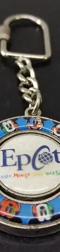 Llavero De Colección Epcot Disney Metálico Giratorio 3.8cm Azul, Rojo Y Blanco — Coleccionables vintage